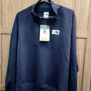 Zip up Navy blue The North face sweet shirt brand New with tags.